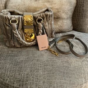 AUTHENTIC Miu Miu handbag gray/taupe color.